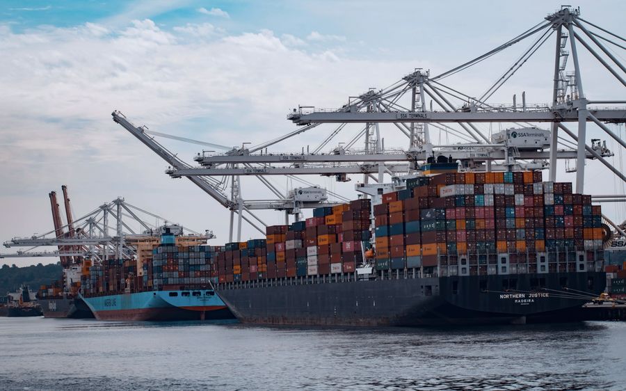Container ship being loaded at a cargo port